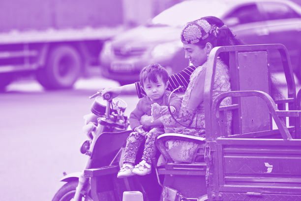 Uyghur Boy on Motorbike